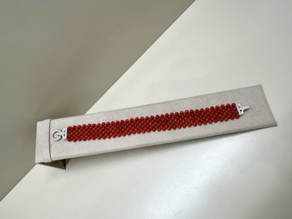 Bracciale multifilo intrecciato con corallo